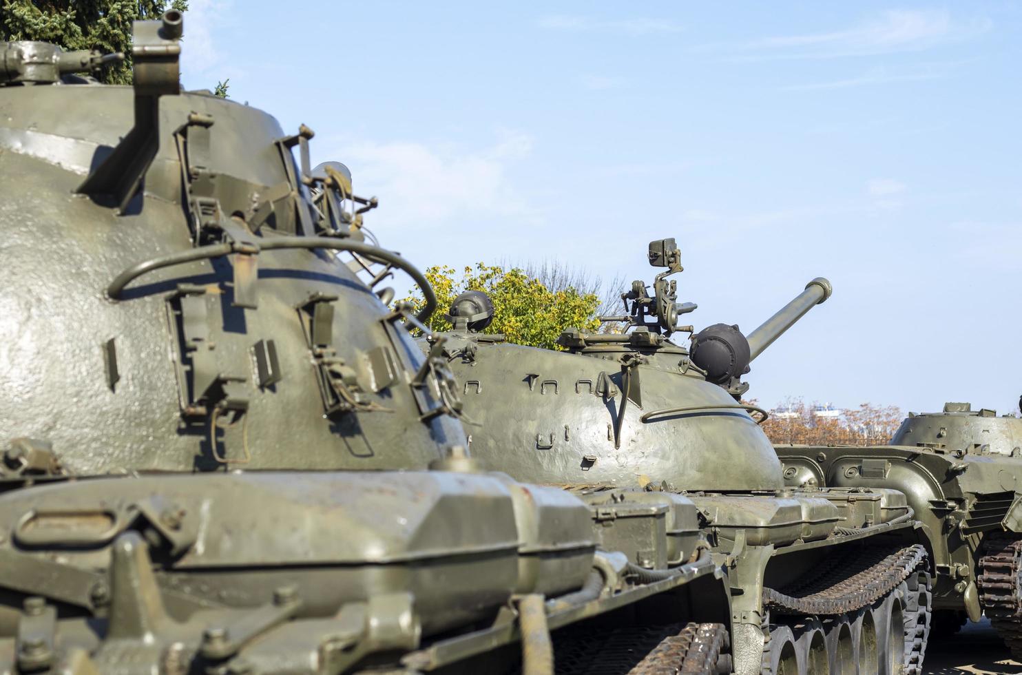 A column of armored vehicles and tanks. National Armed Forces. Military equipment and troops. War in Ukraine. Building or building combat vehicles. Armored weapons. means of the armed forces. photo