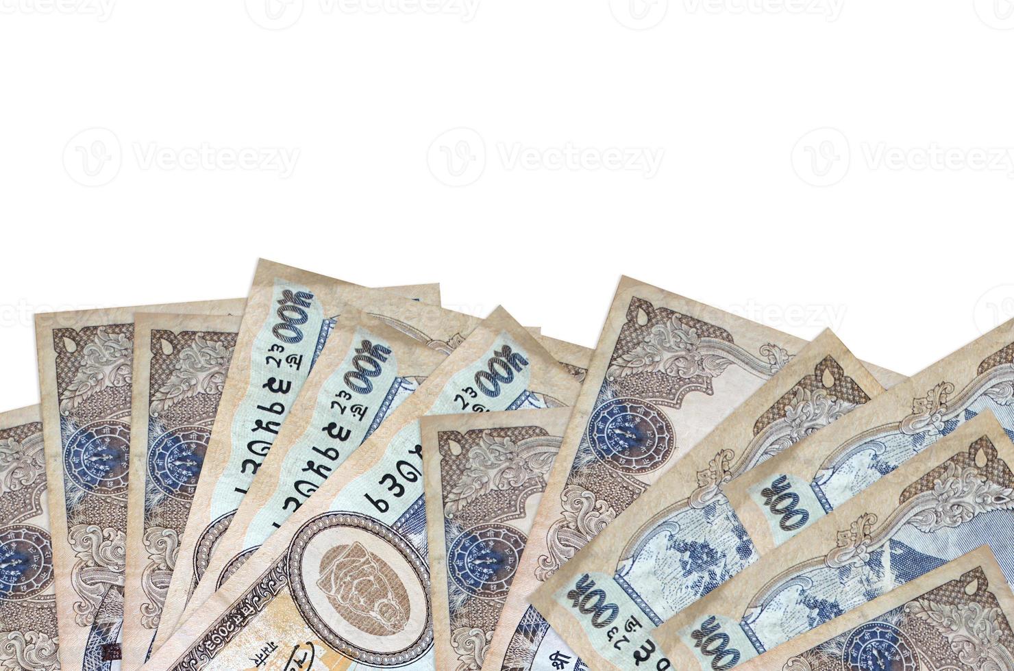 500 Nepalese rupees bills lies on bottom side of screen isolated on white background with copy space. Background banner template photo