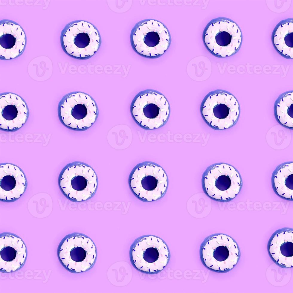 Many small plastic donuts lies on a pastel colorful background. Flat lay minimal pattern. Top view photo
