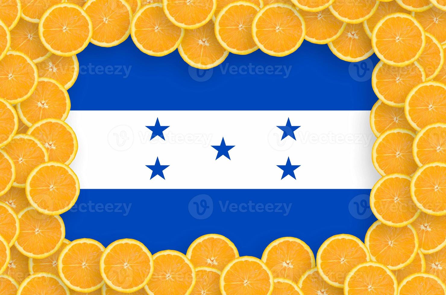 Honduras flag in fresh citrus fruit slices frame photo