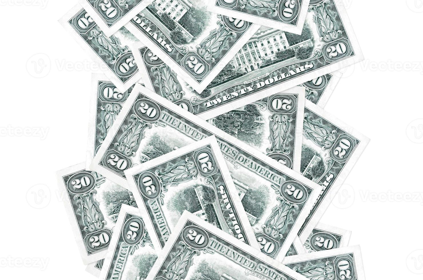 20 US dollars bills flying down isolated on white. Many banknotes falling with white copyspace on left and right side photo