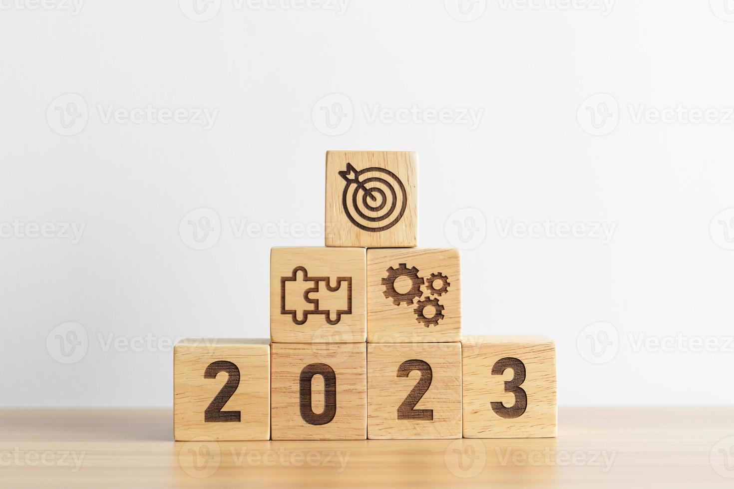 2023 wood block with business goal, plan. Action strategy, target, mission, teamwork, idea and New Year start concept photo