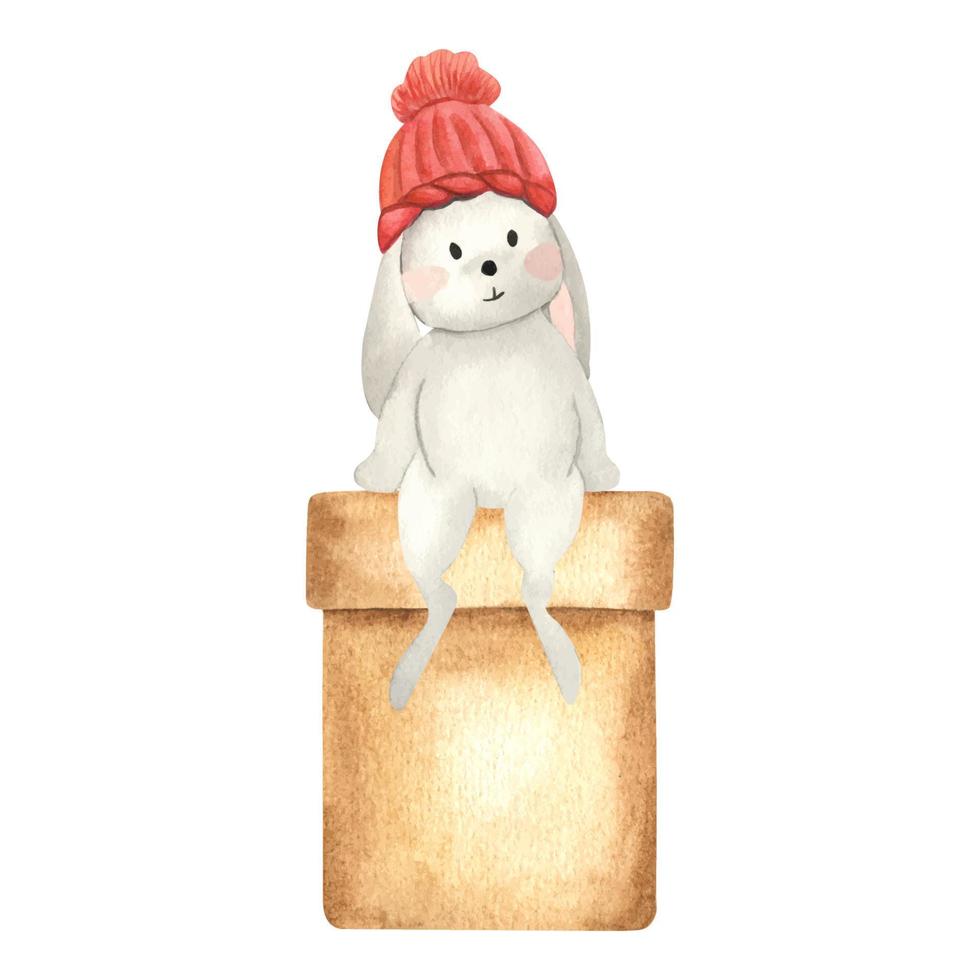 A watercolor bunny sits on a gift box. Watercolor illustration drawn by hands. Cute Christmas character for greeting cards and invitations. 2023 vector