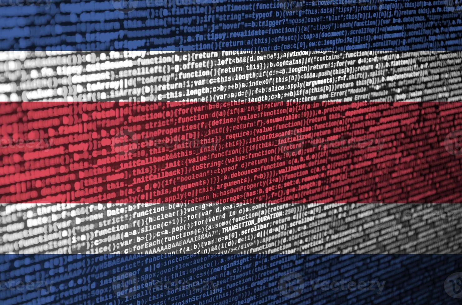 Costa Rica flag is depicted on the screen with the program code. The concept of modern technology and site development photo