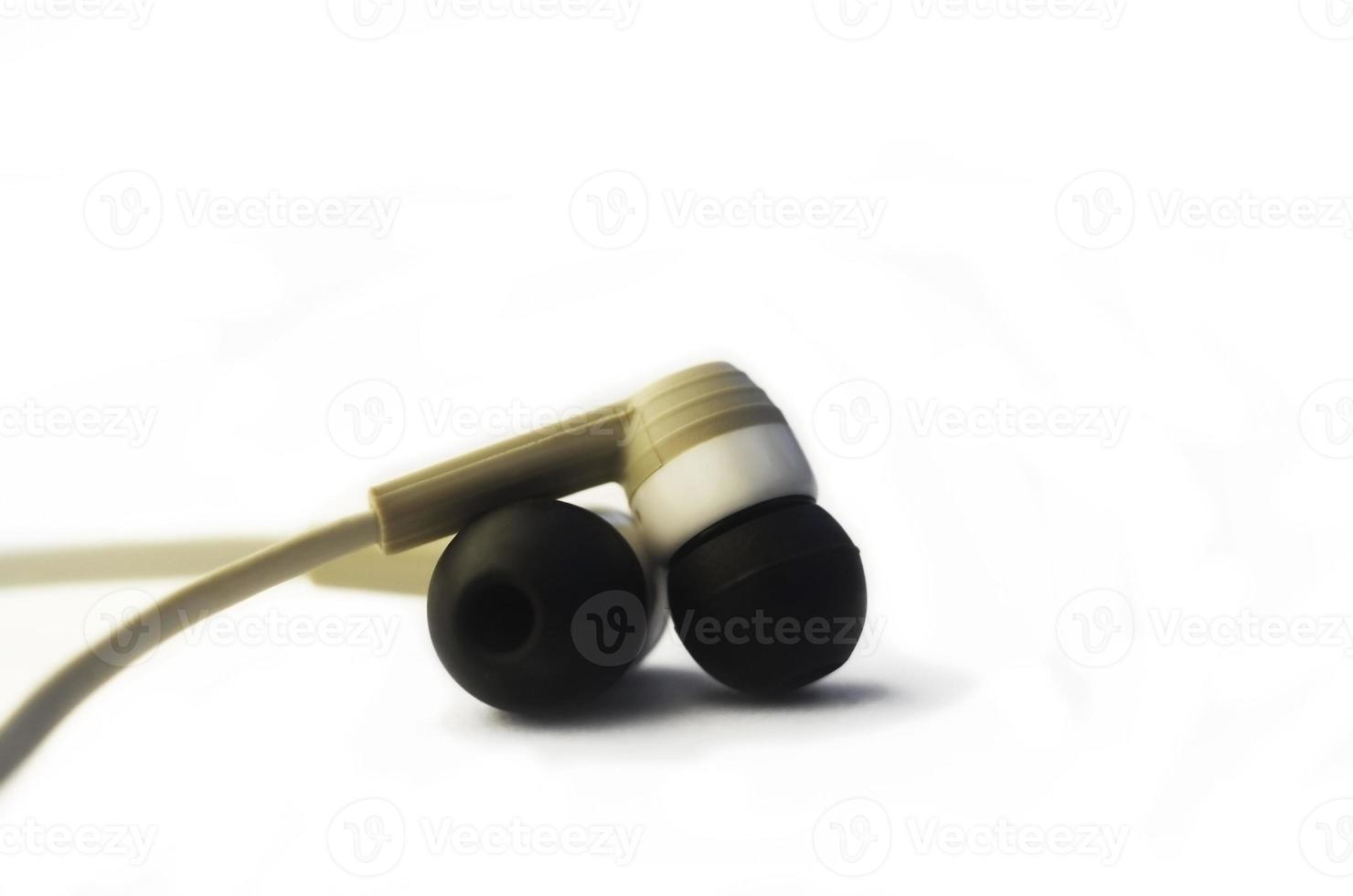 Earphones isolated on white photo