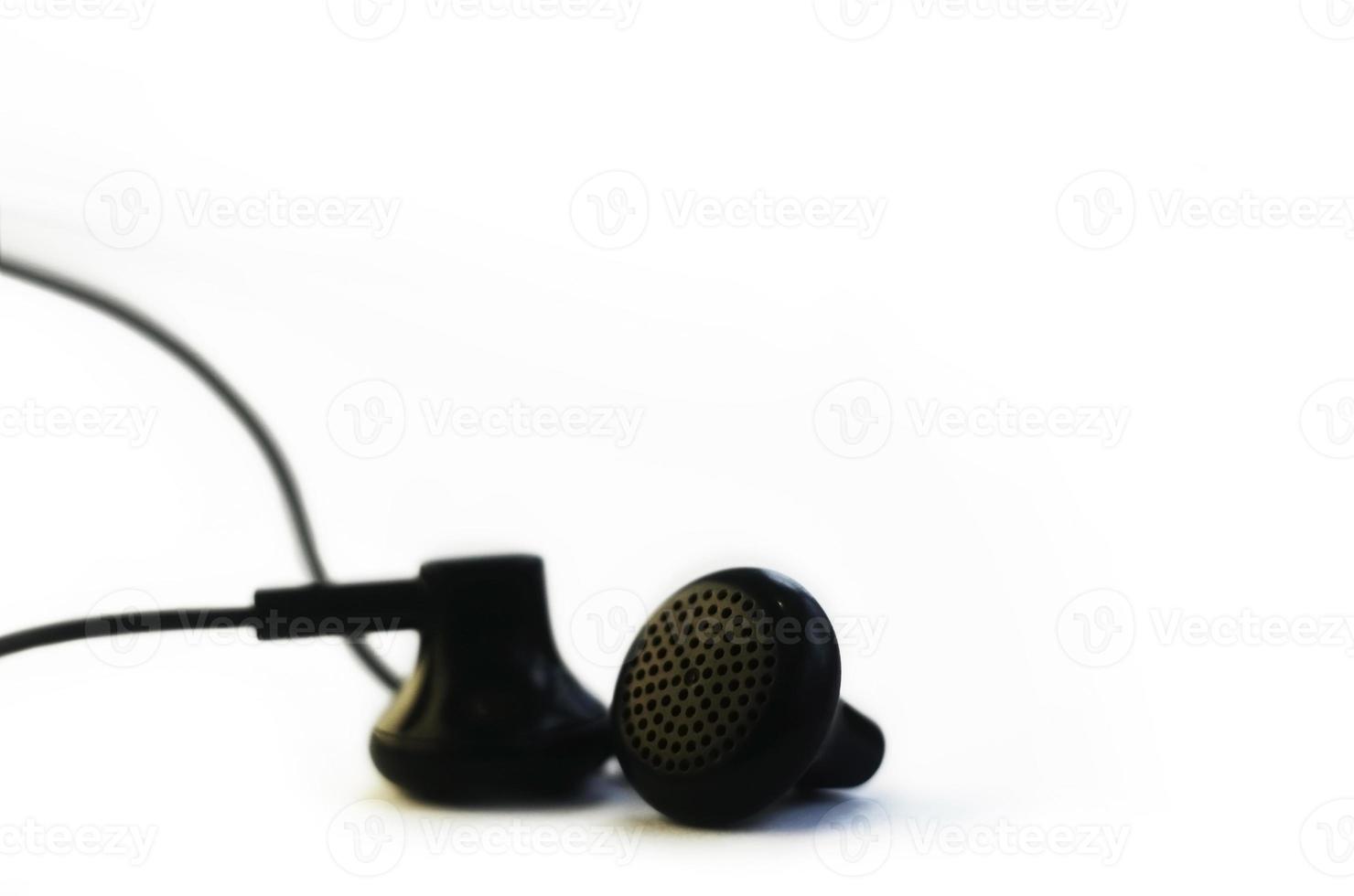 Earphones isolated on white photo