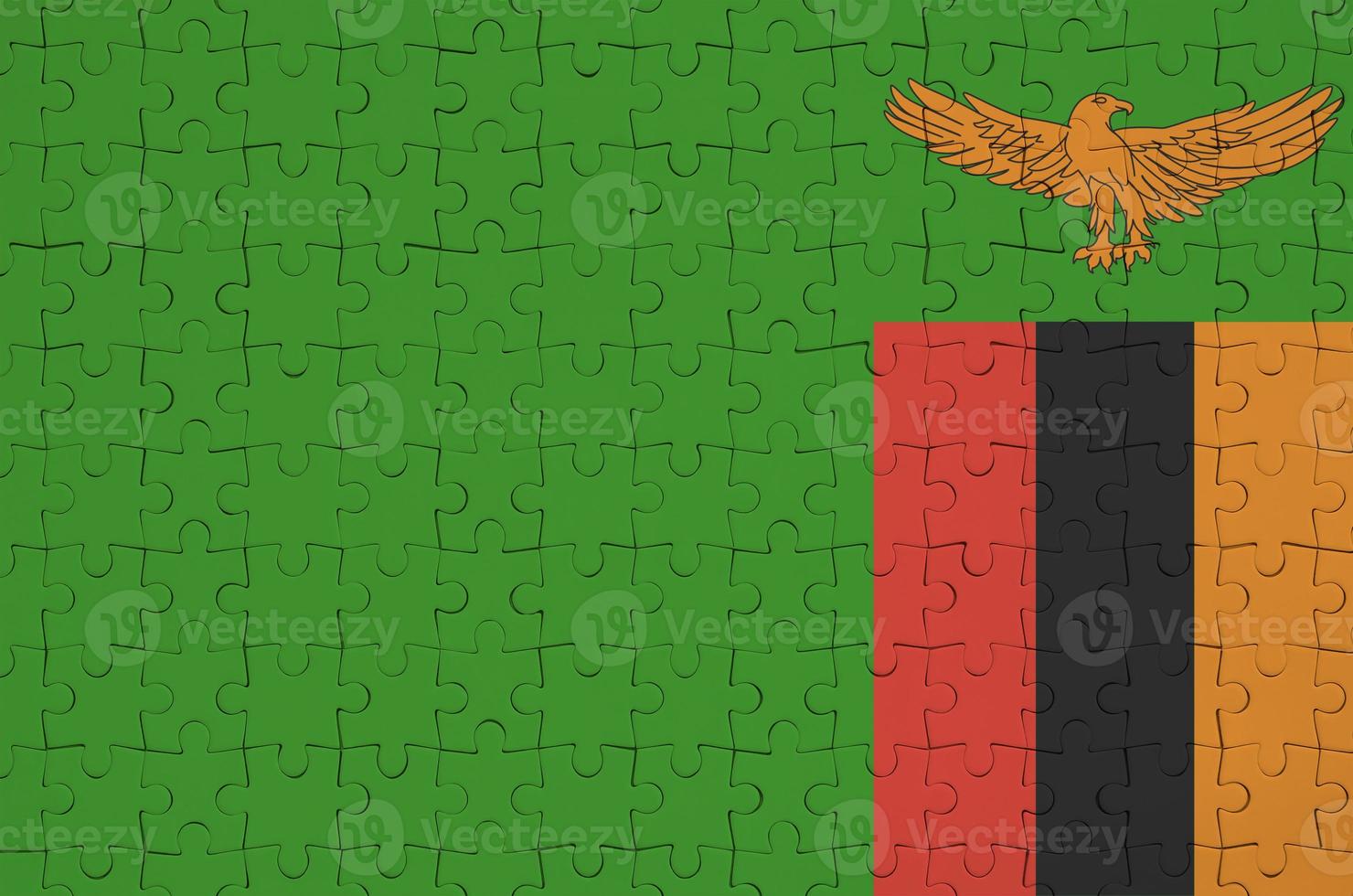 Zambia flag is depicted on a folded puzzle photo