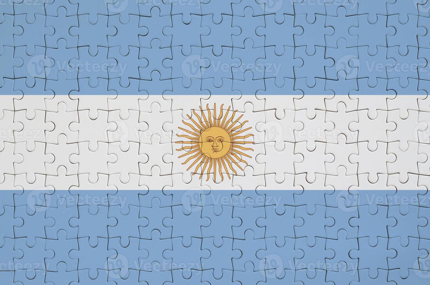 Argentina flag is depicted on a folded puzzle photo