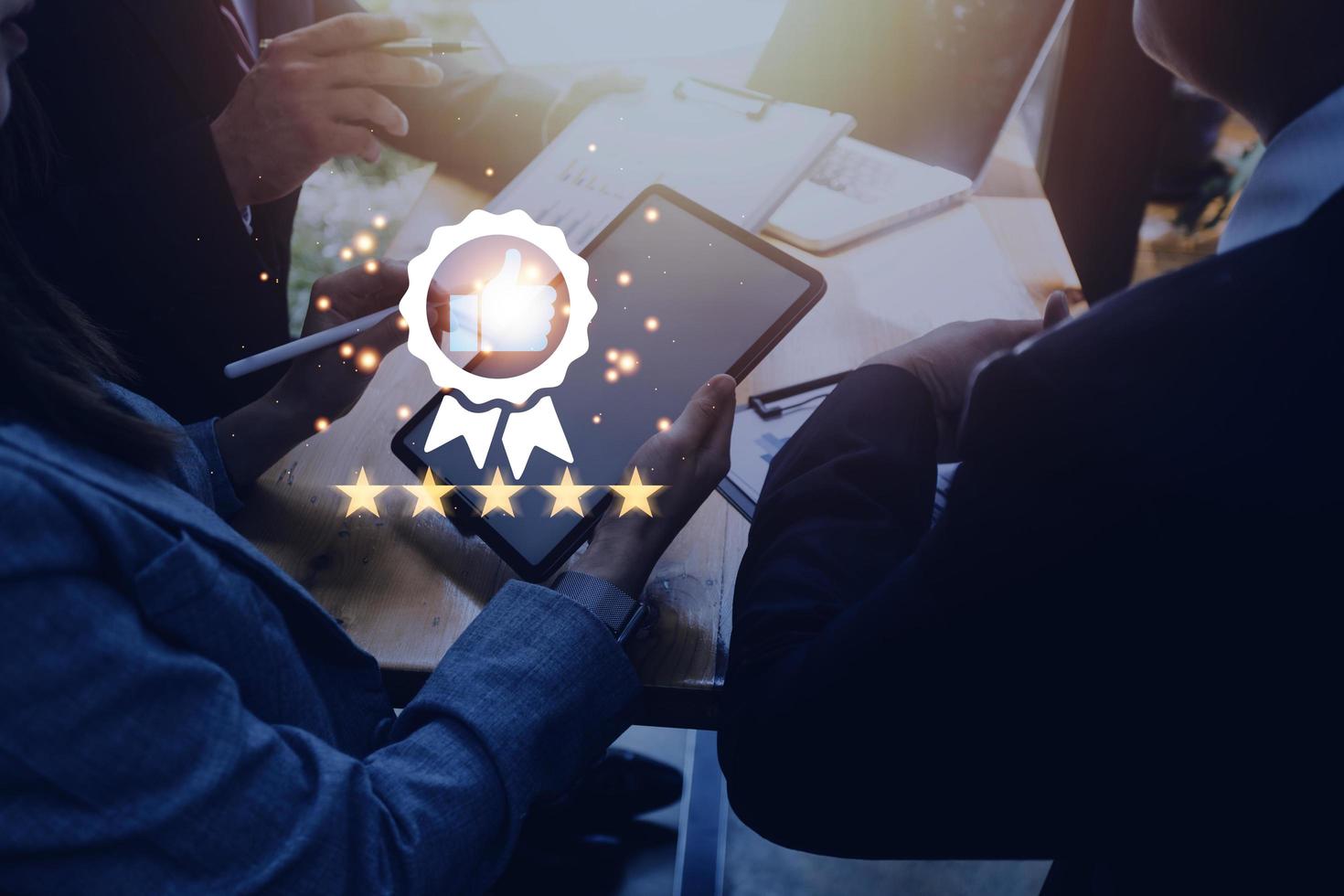 Hand shows the sign of the top service Quality assurance, Guarantee, Standards, ISO certification and standardization concept, satisfaction, service experience. photo
