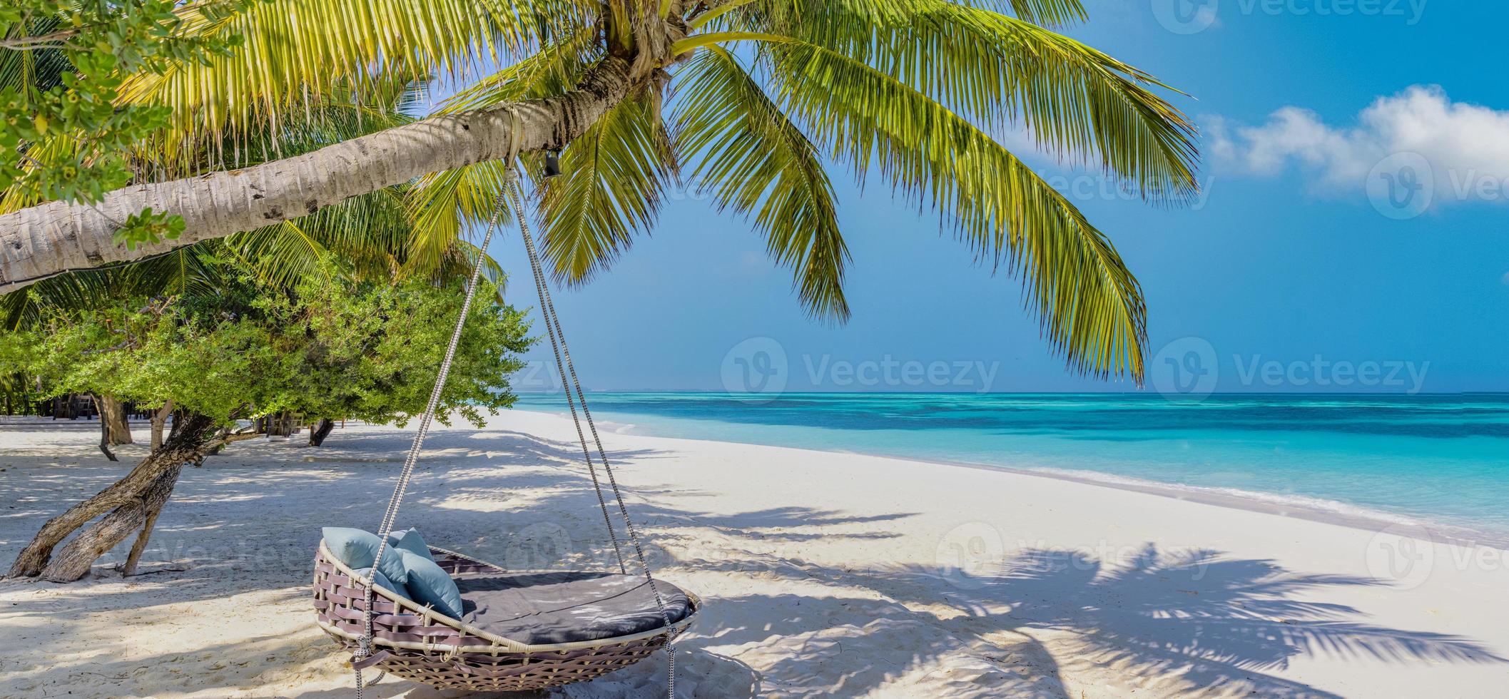 Amazing beach landscape, super wide panoramic exotic travel background. Luxury travel, idyllic couple honeymoon love destination. Sunny sea sand sky, exotic resort coast. Palm lagoon, seascape banner photo