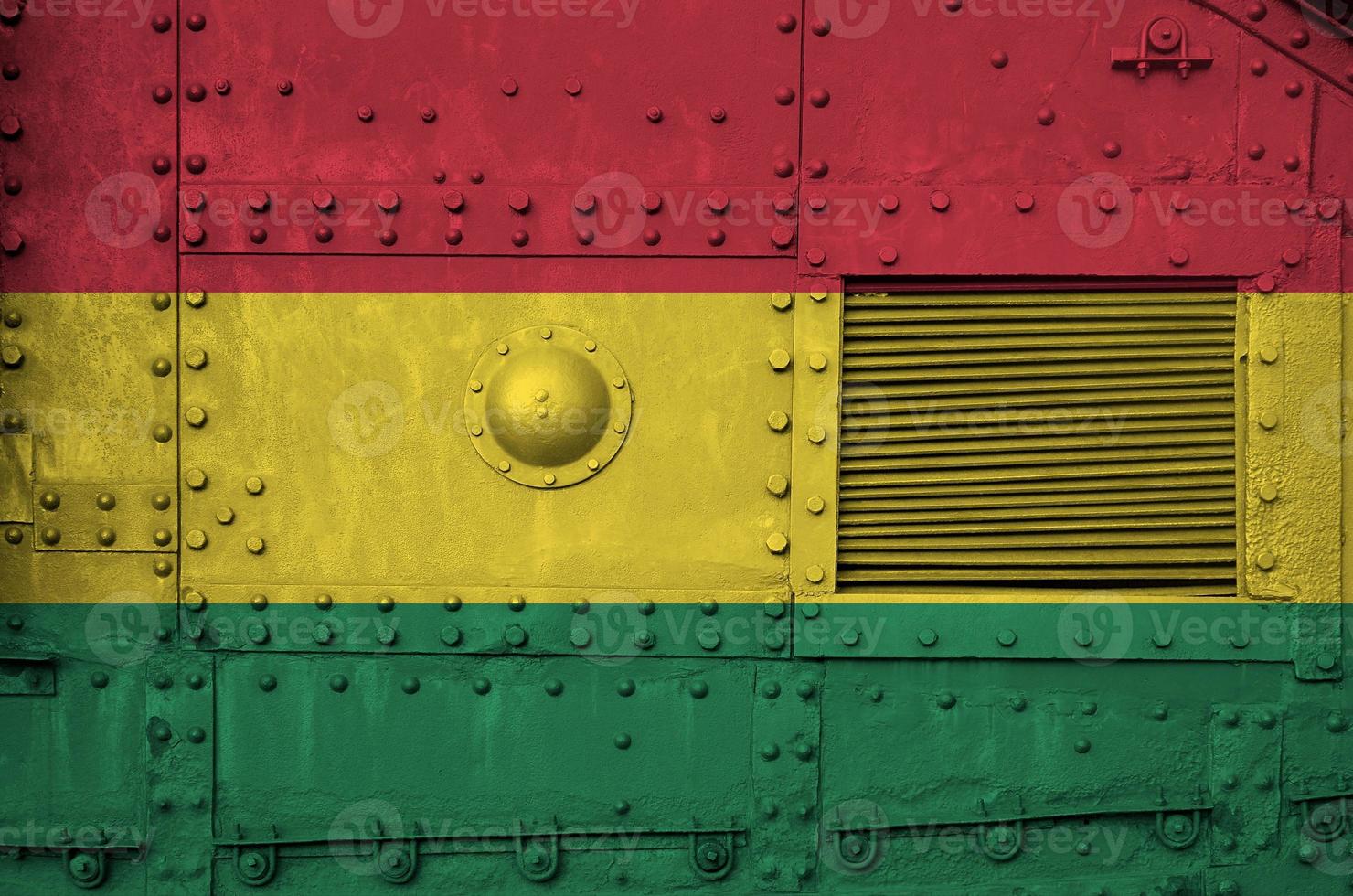 Bolivia flag depicted on side part of military armored tank closeup. Army forces conceptual background photo