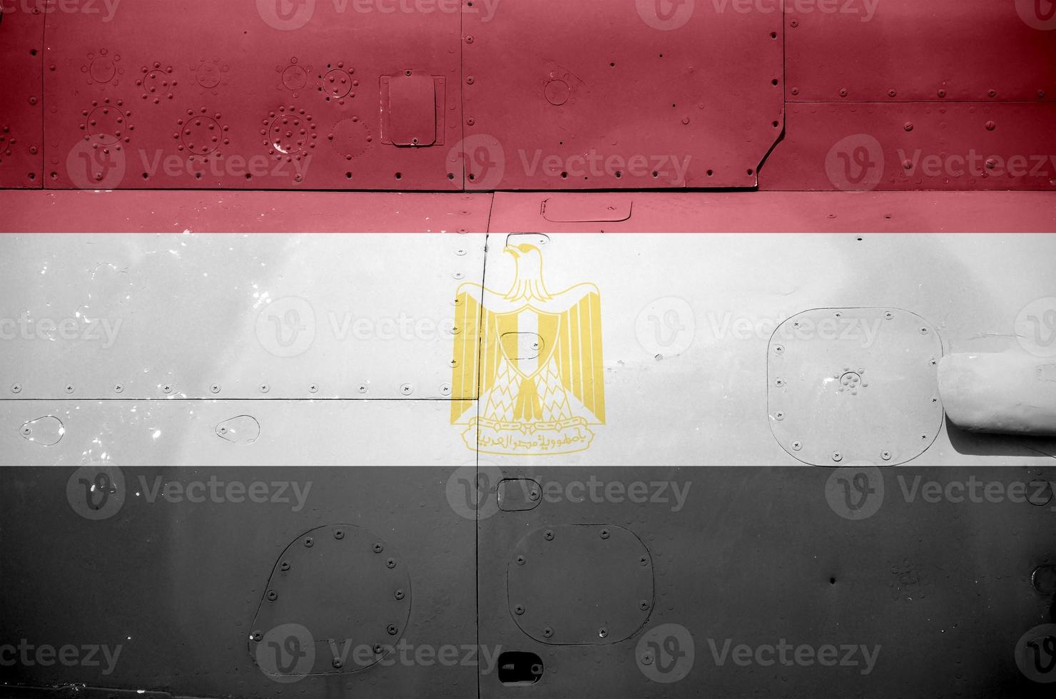 Egypt flag depicted on side part of military armored helicopter closeup. Army forces aircraft conceptual background photo