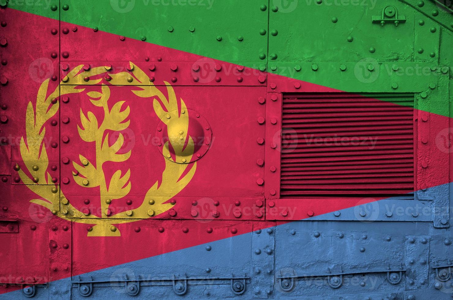 Eritrea flag depicted on side part of military armored tank closeup. Army forces conceptual background photo