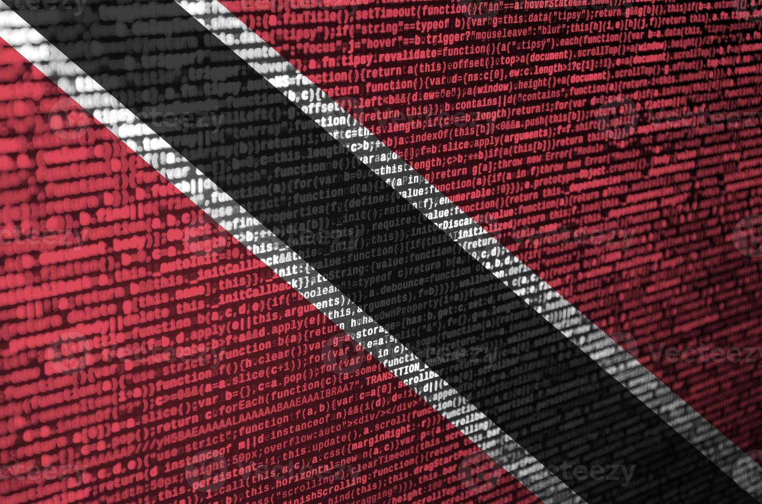 Trinidad and Tobago flag is depicted on the screen with the program code. The concept of modern technology and site development photo