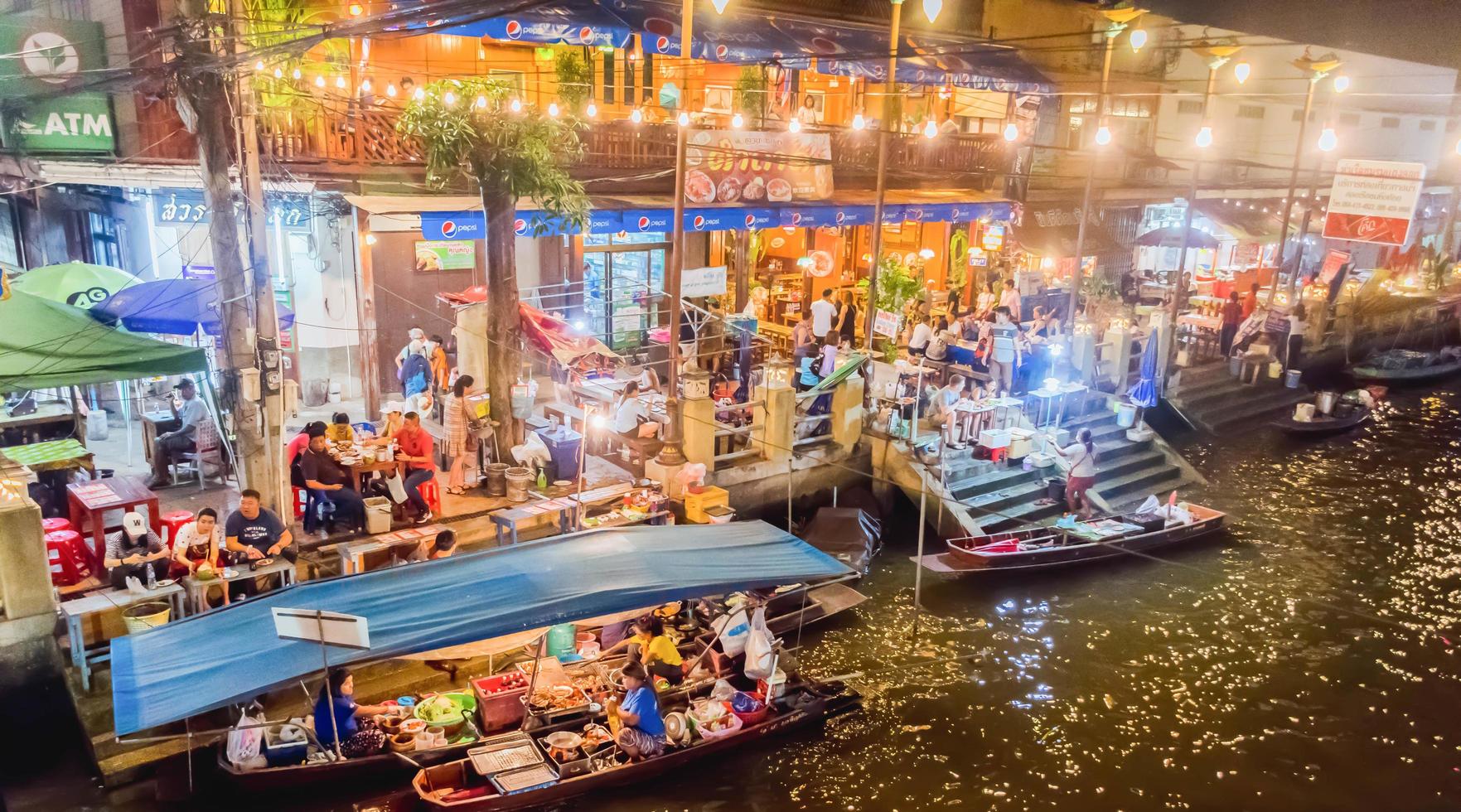 Environment, lifestyle, Amphawa Floating Market, Samut Songkhram, Thailand. Year 2020 photo