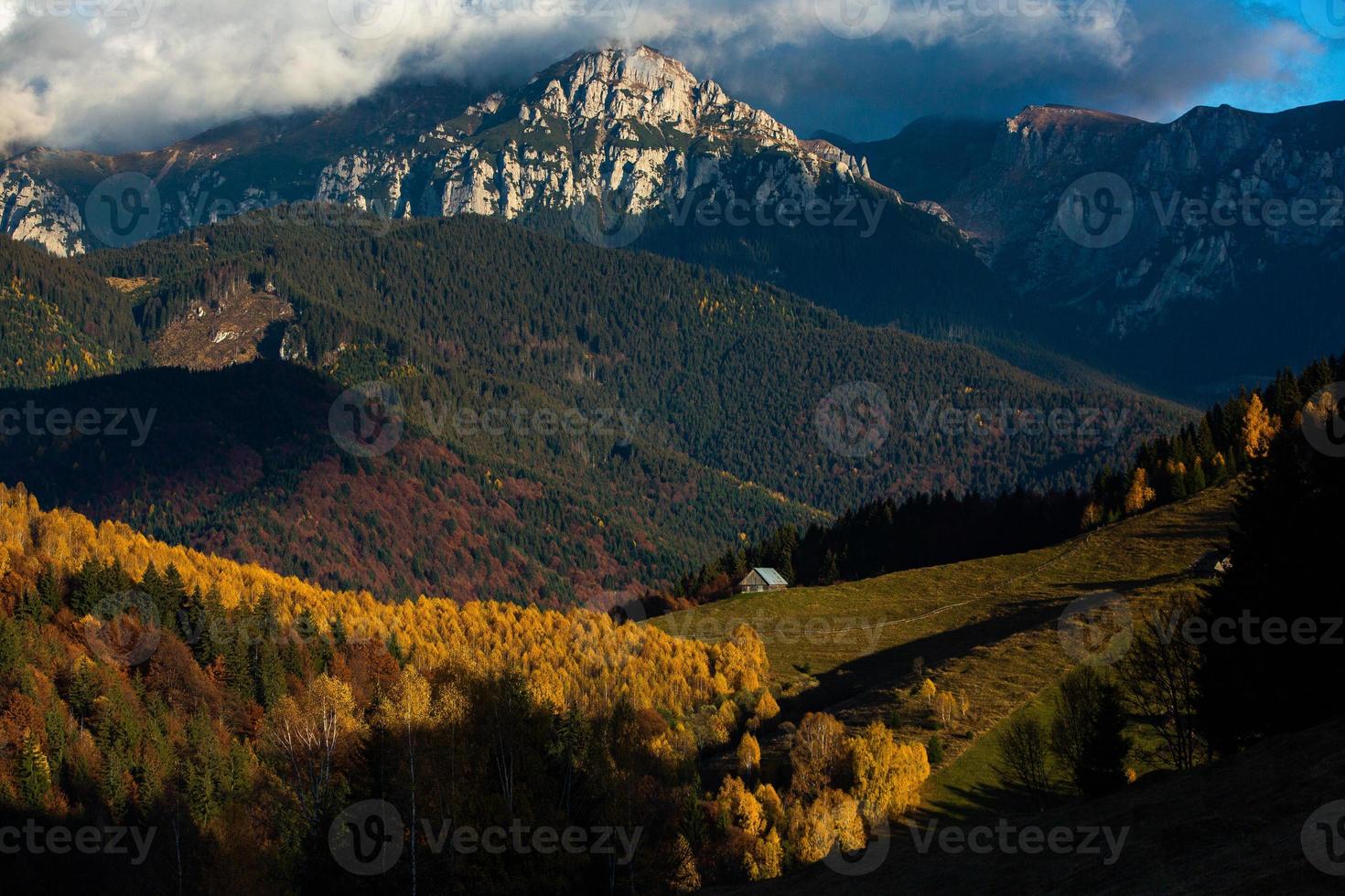 A charming mountain landscape in the Bucegi mountains, Carpathians, Romania. Autumn nature in Moeciu de Sus, Transylvania photo