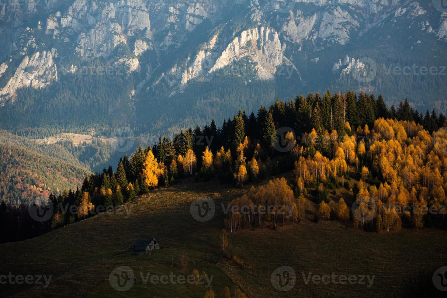 A charming mountain landscape in the Bucegi mountains, Carpathians, Romania. Autumn nature in Moeciu de Sus, Transylvania photo