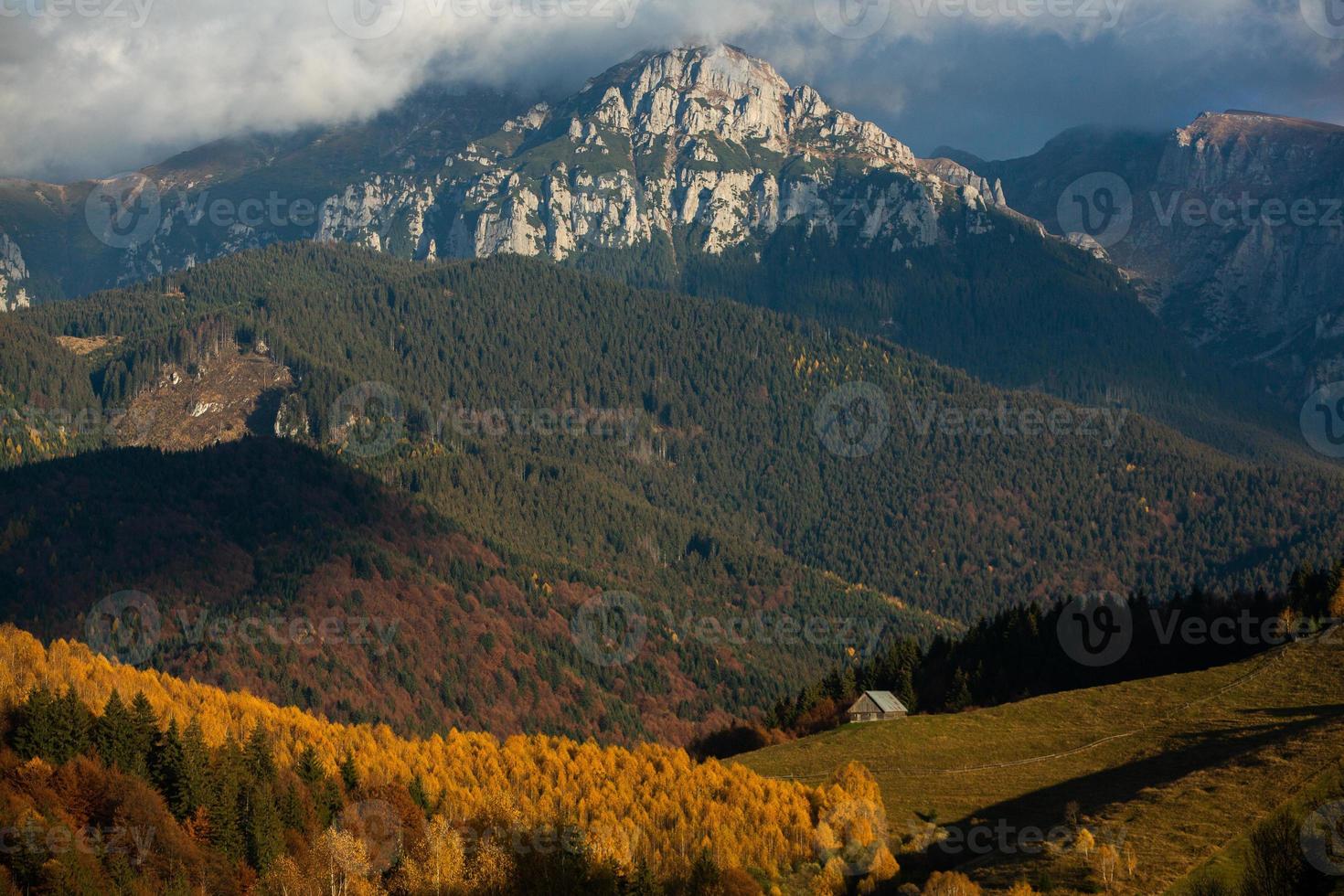 A charming mountain landscape in the Bucegi mountains, Carpathians, Romania. Autumn nature in Moeciu de Sus, Transylvania photo