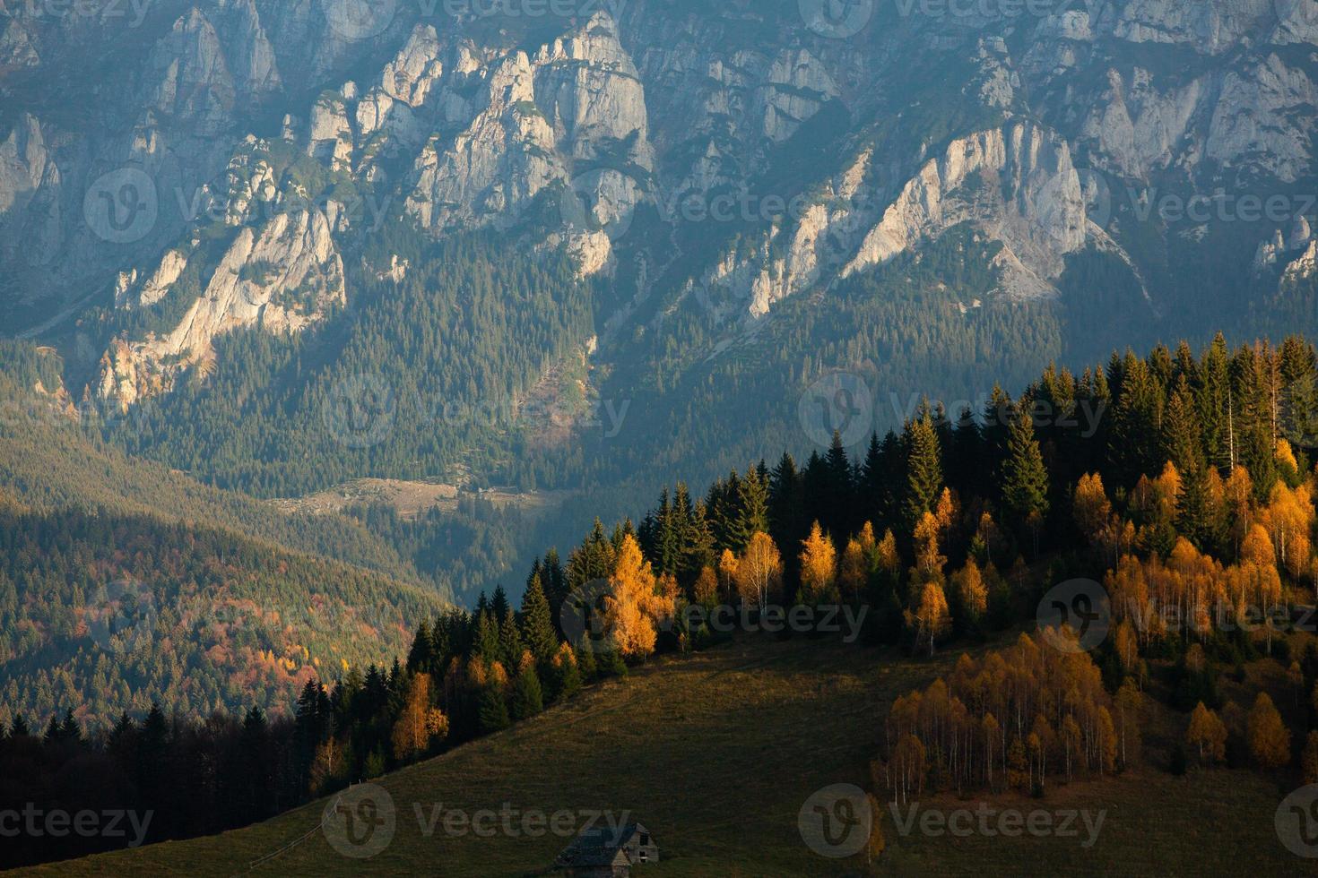 A charming mountain landscape in the Bucegi mountains, Carpathians, Romania. Autumn nature in Moeciu de Sus, Transylvania photo