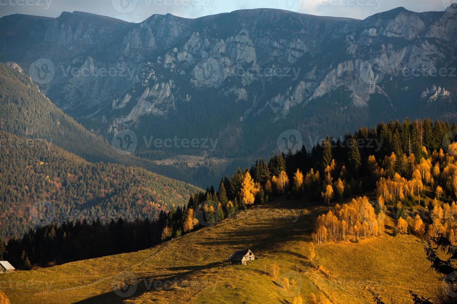 A charming mountain landscape in the Bucegi mountains, Carpathians, Romania. Autumn nature in Moeciu de Sus, Transylvania photo