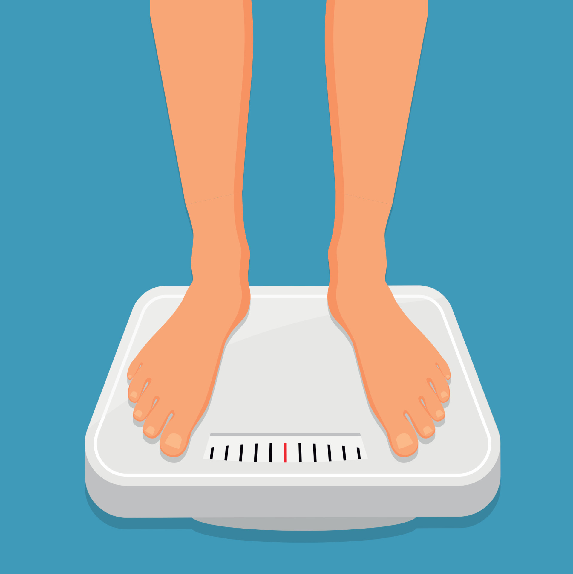 Woman is standing on bathroom scales,top view of feet. Weight