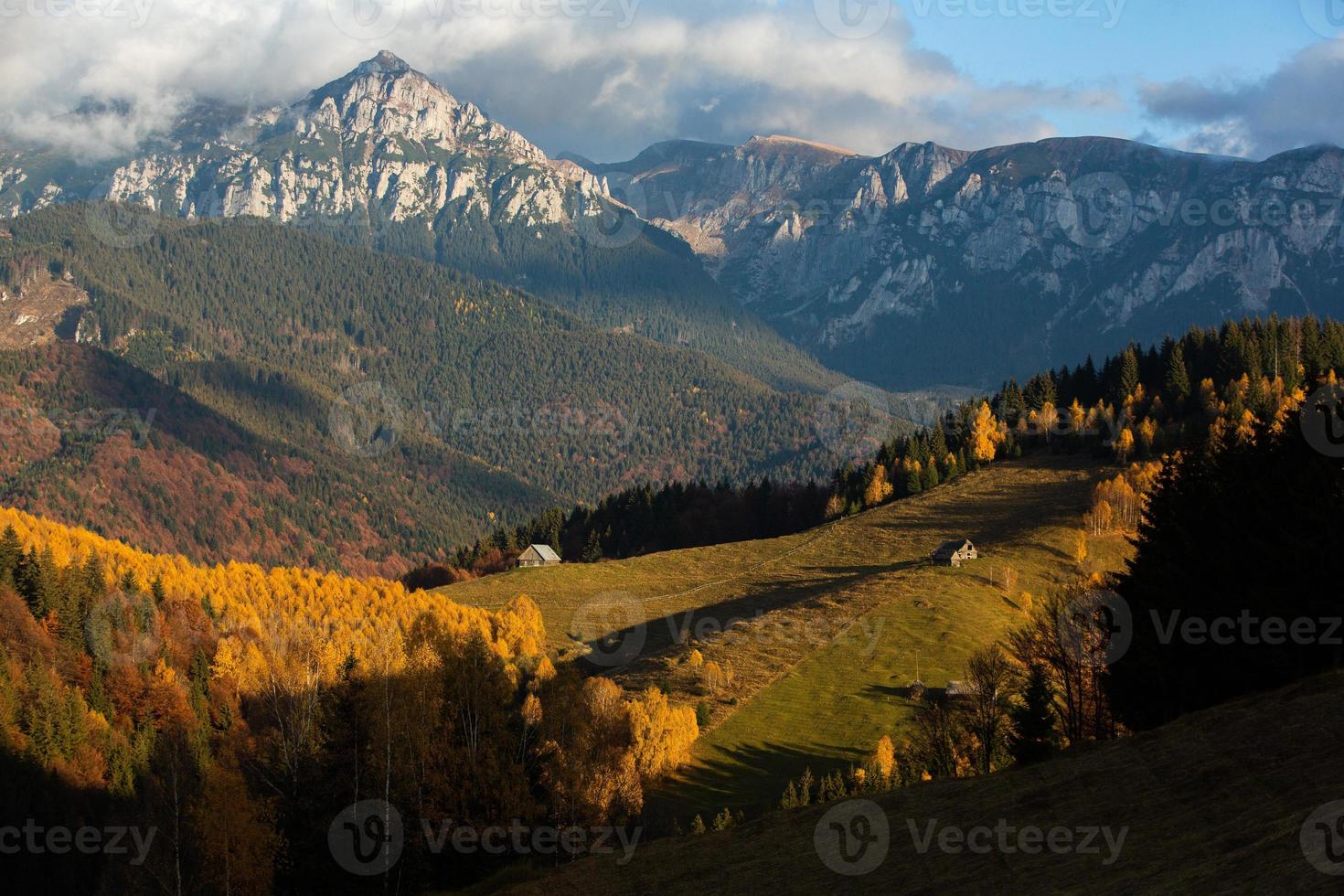 A charming mountain landscape in the Bucegi mountains, Carpathians, Romania. Autumn nature in Moeciu de Sus, Transylvania photo