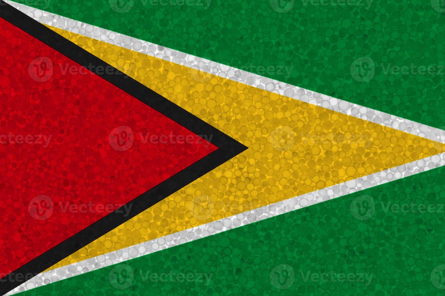 Flag of Guyana on styrofoam texture photo