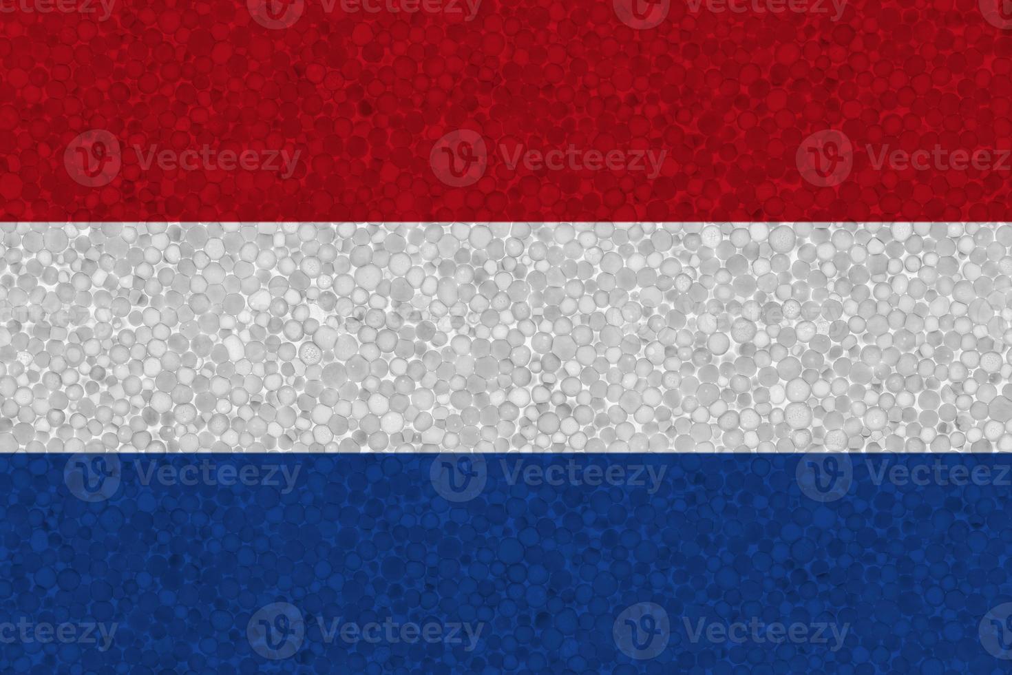 Flag of Netherlands on styrofoam texture photo