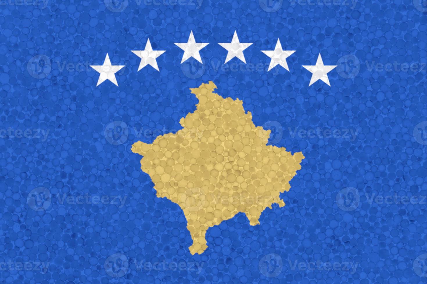 Flag of Kosovo on styrofoam texture photo