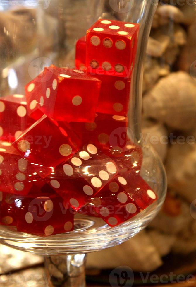 Translucent Red Dice in a Vintage Glass Container 14004494 Stock Photo