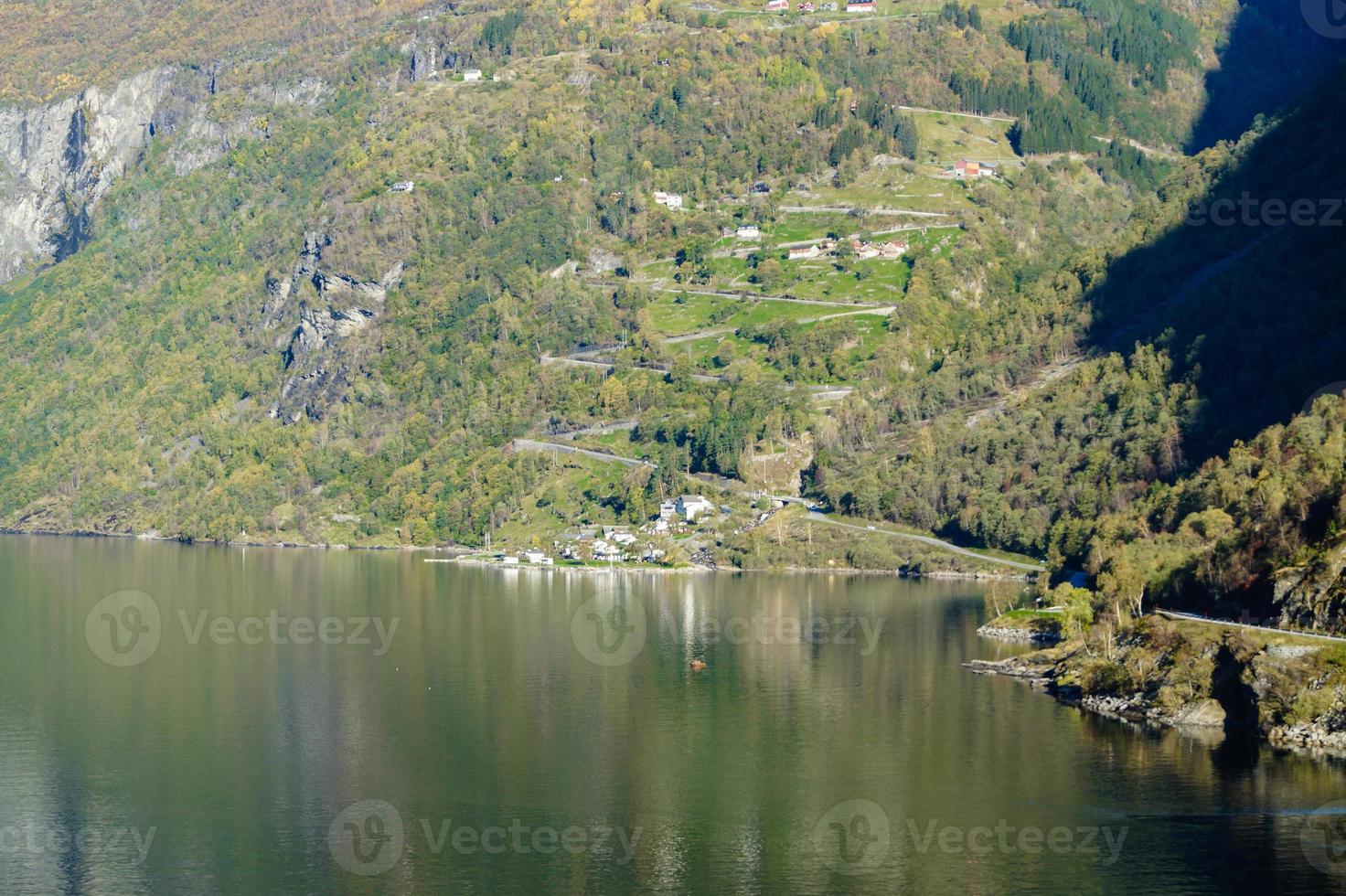 With a cruise ship in the fjords of norway photo