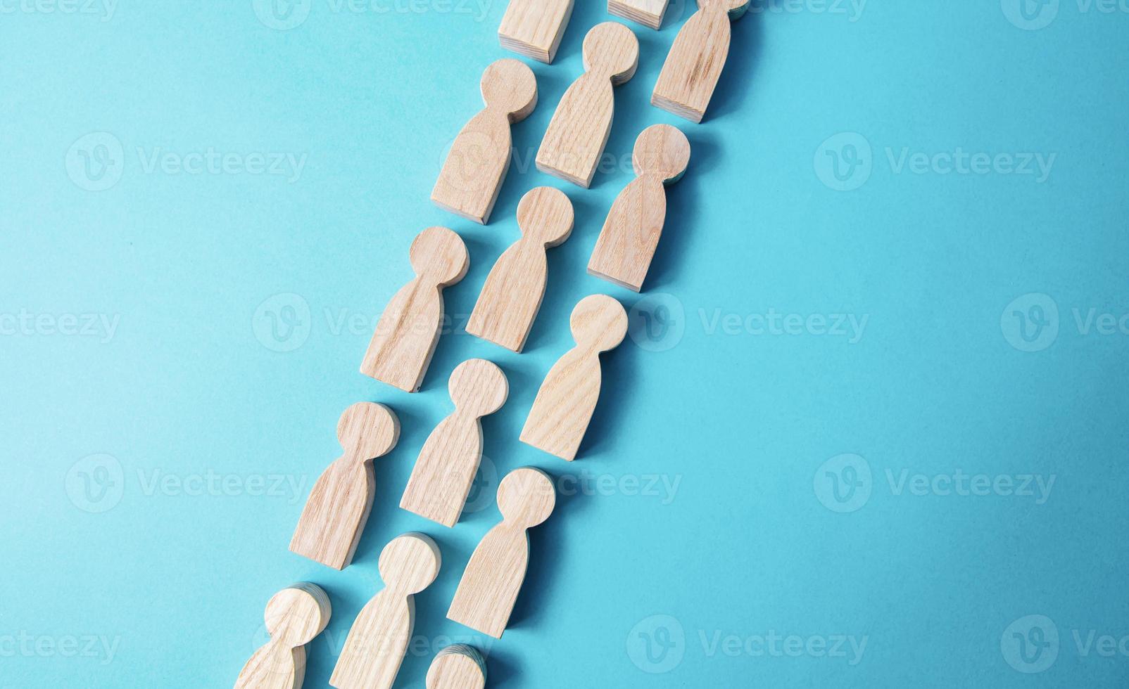 Chain people figures . Queue line. The movement of people in one direction. Human resources. Discipline. Social organization, joining consolidated forces. Team building. Common cause. Cooperation. photo