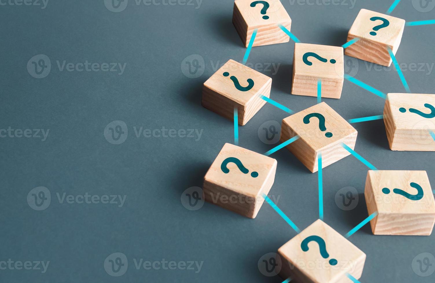 Blocks with questions connected in a network. Lots of unknown facts. Curiosity, exploration. Questions and problem solving. Technologies, extraction of knowledge and hidden information. photo