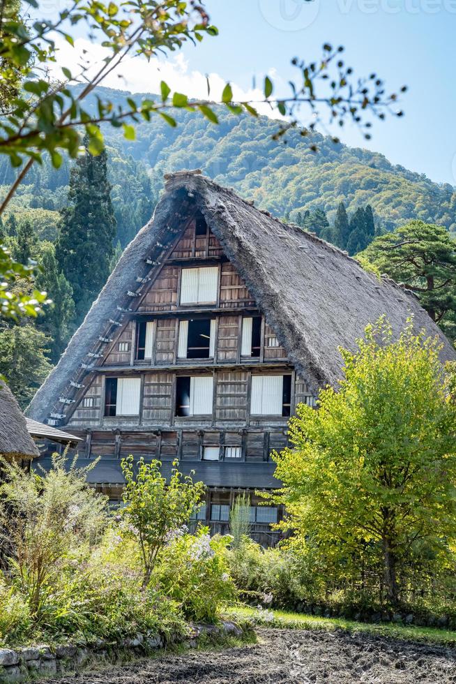 Shirakawa Traditional and Historical Japanese village Shirakawago in autumn. House build by wooden with roof gassho zukuri style. Shirakawa-go is Unesco world heritage and top landmark spot in Japan. photo