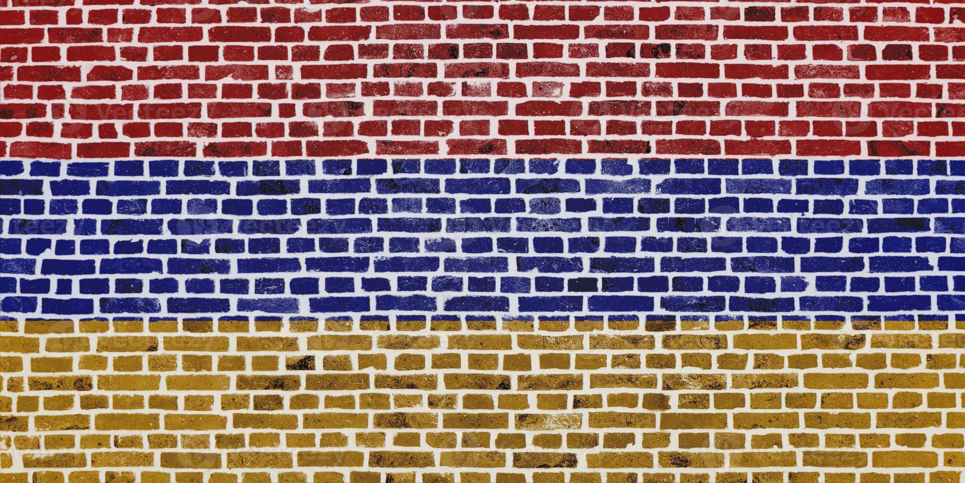 Flag of Armenia painted on a brick wall photo