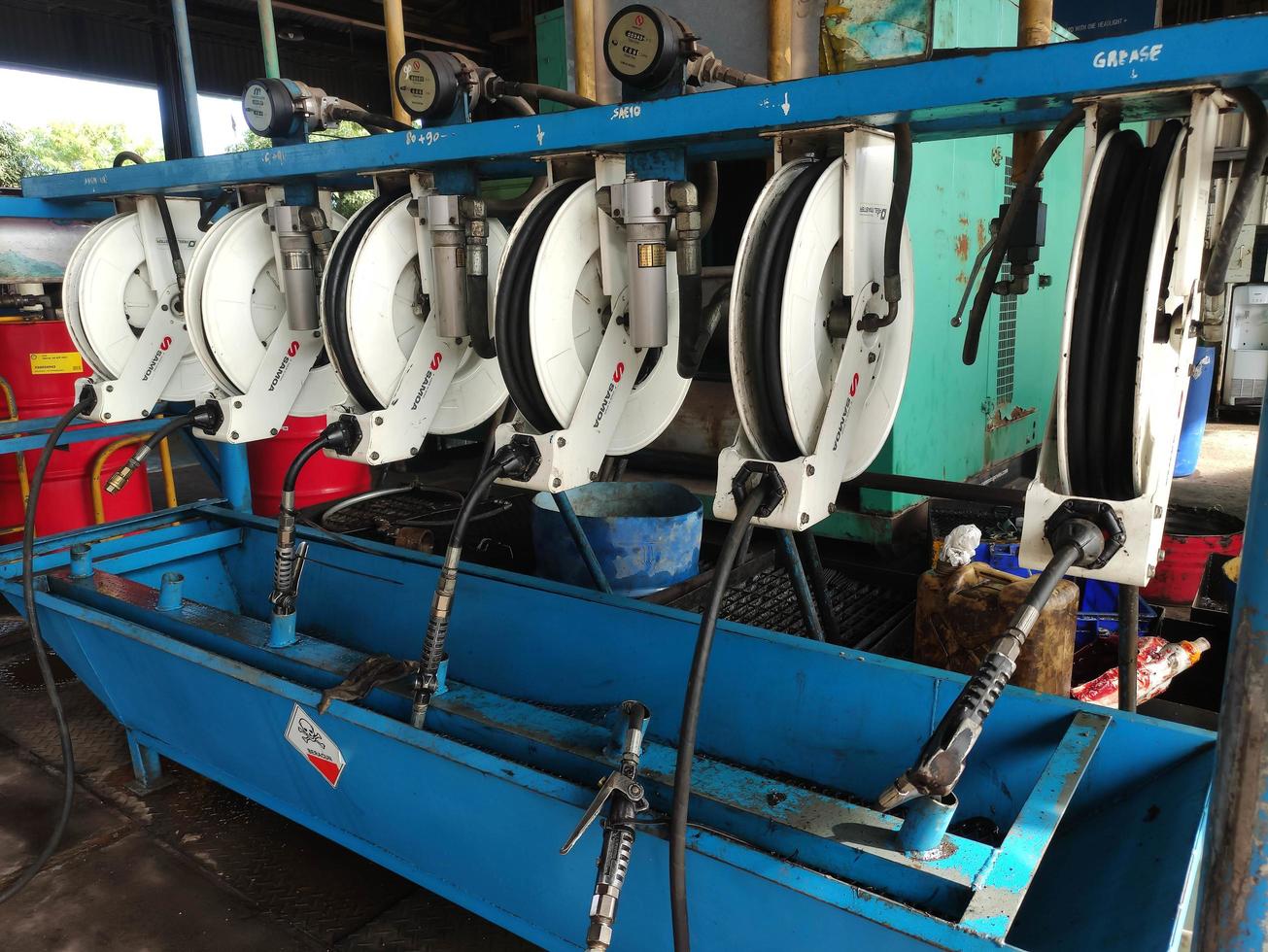 Samoa Reelmaster Waste Oil Hose Reels for use in workshop or garage photo