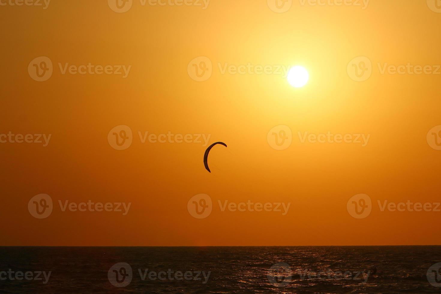 The Sun is the hottest star in our Galaxy around which the Earth revolves. photo
