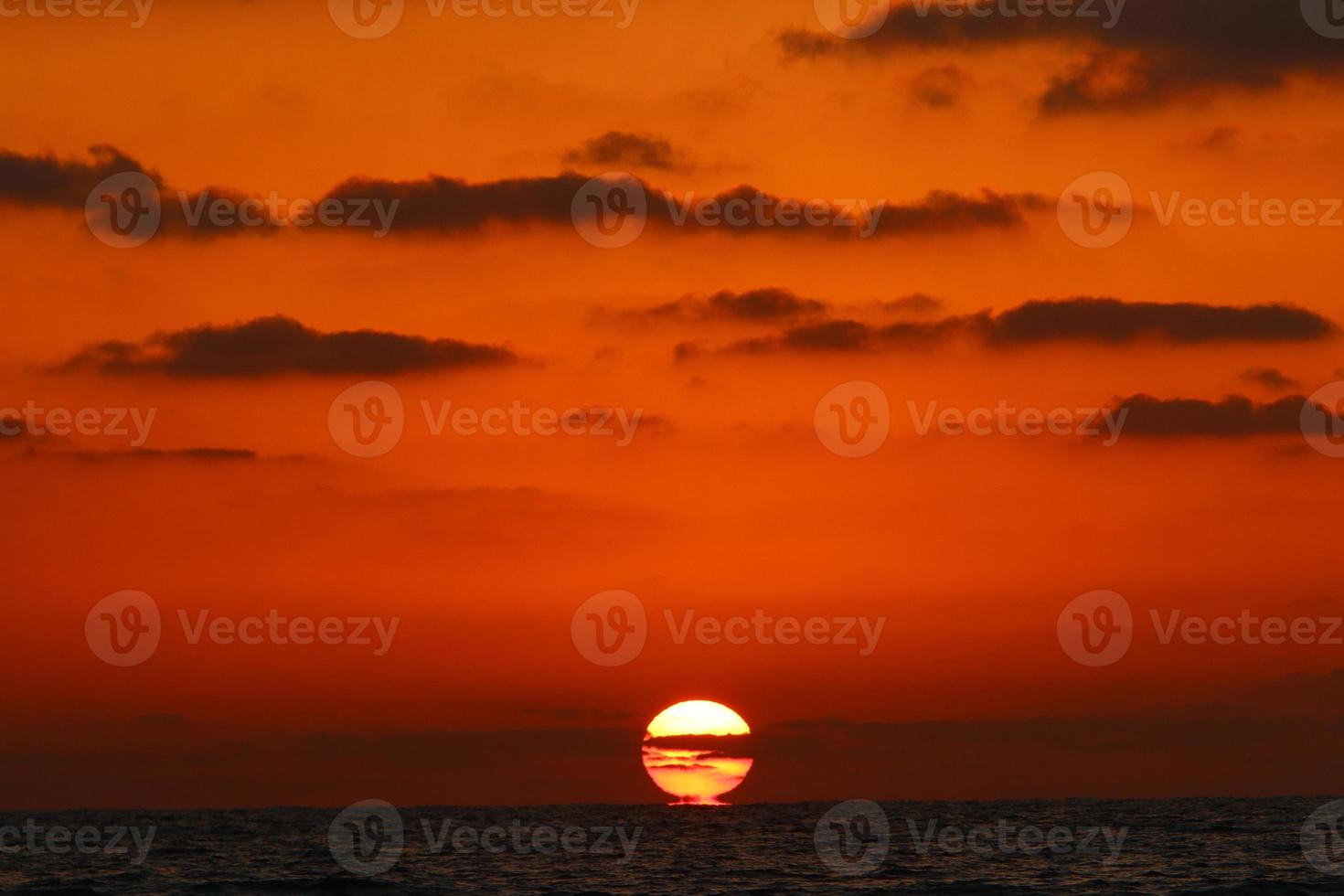 The Sun is the hottest star in our Galaxy around which the Earth revolves. photo