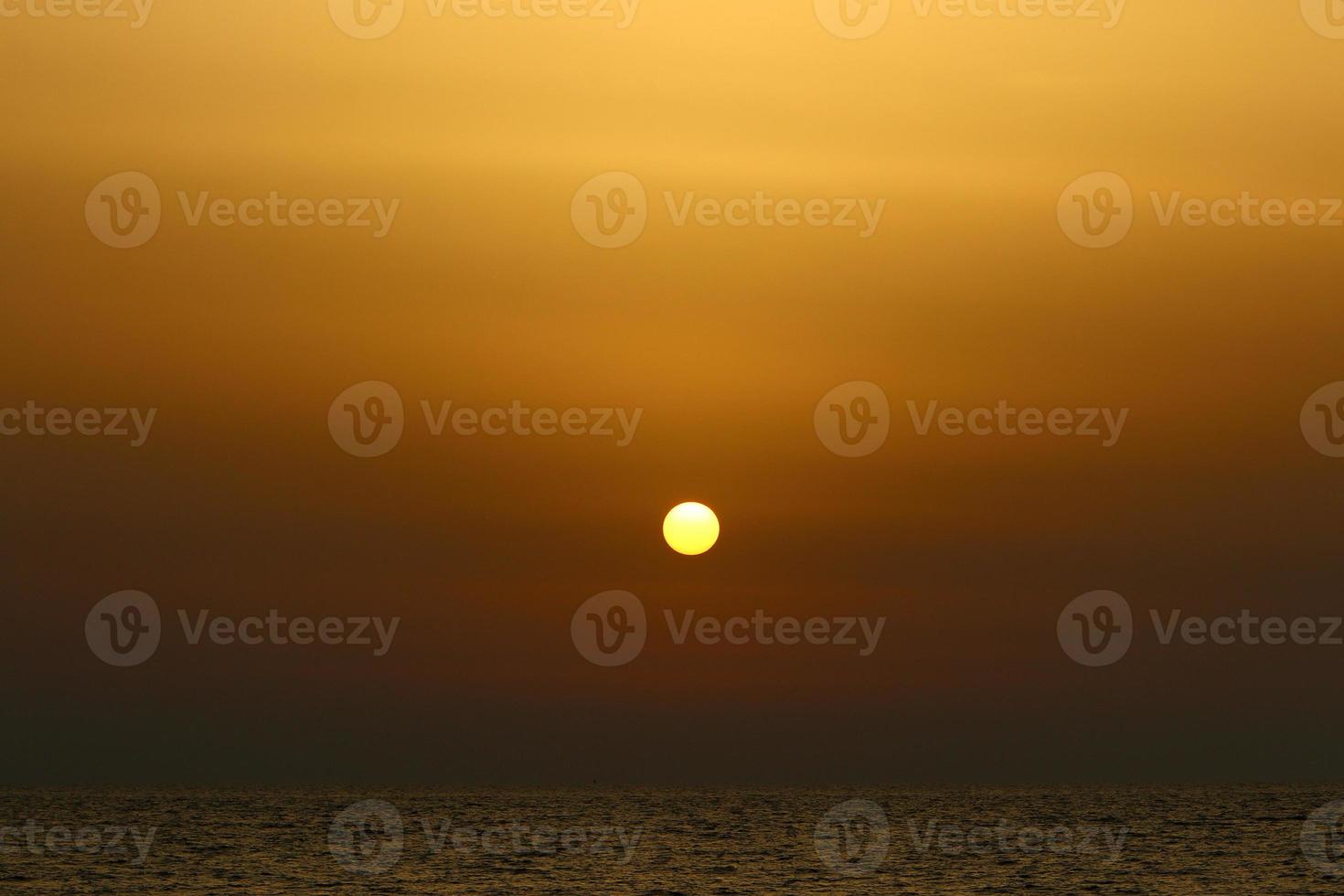 The Sun is the hottest star in our Galaxy around which the Earth revolves. photo