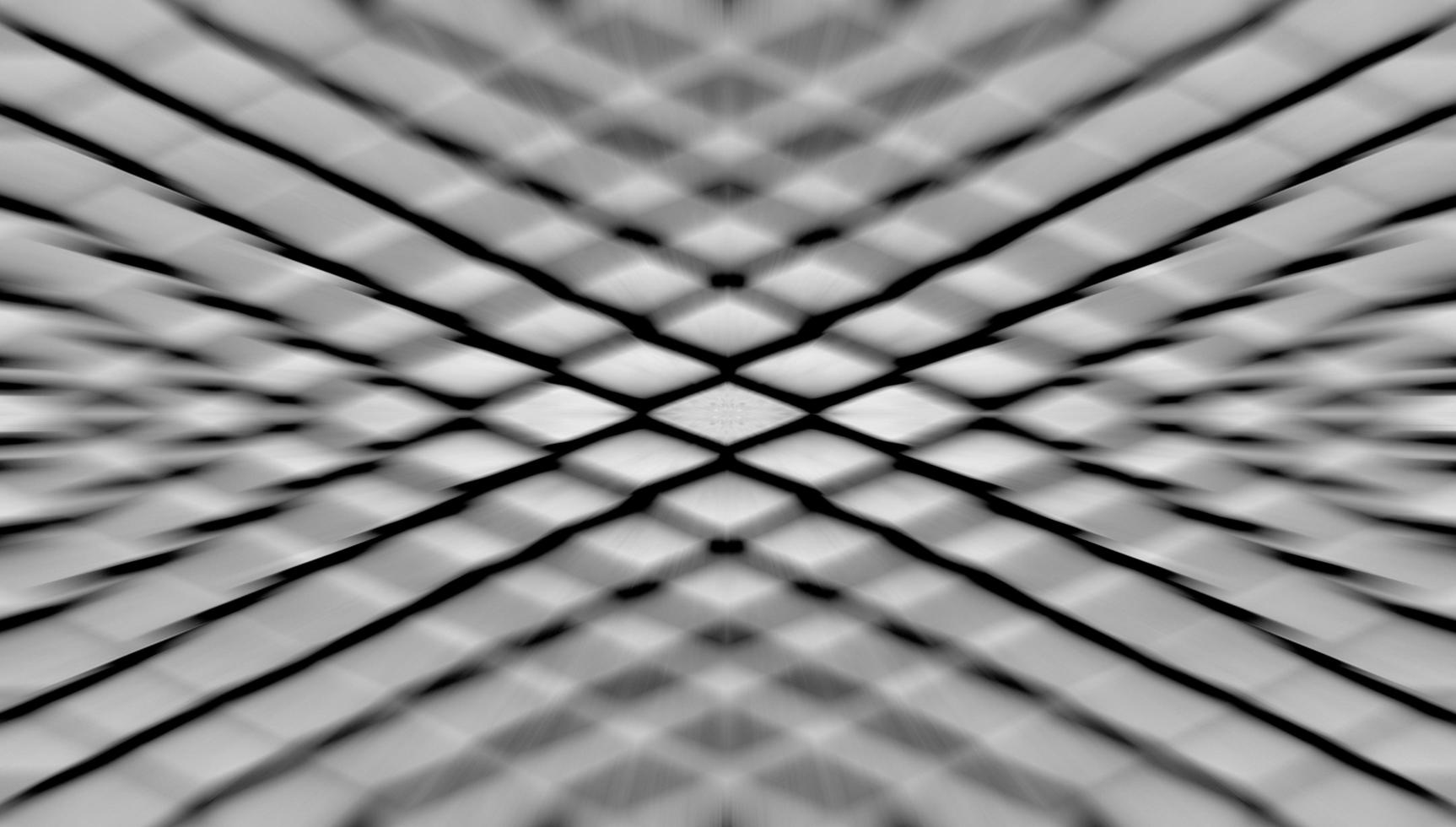 Black and white color geometric mesh pattern background with zoom effect photo