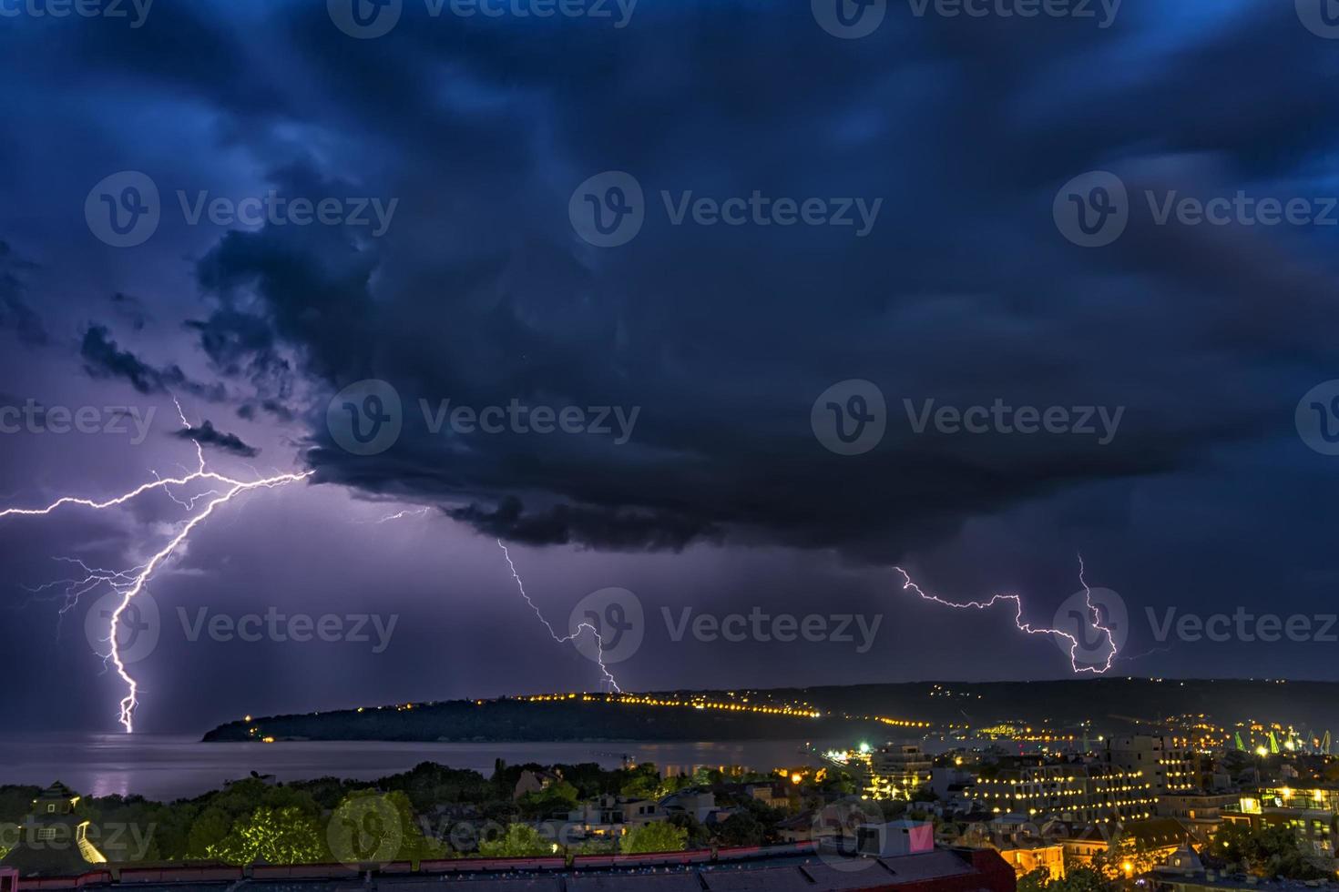 Exciting powerful lightning over the sea, zipper and thunderstorm, Varna. Bulgaria photo