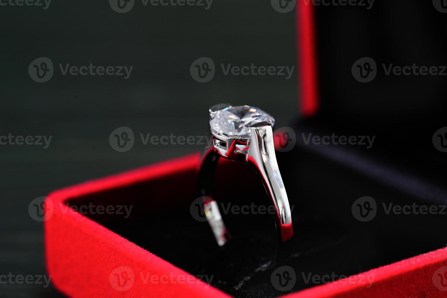 Diamond ring in red jewel box photo