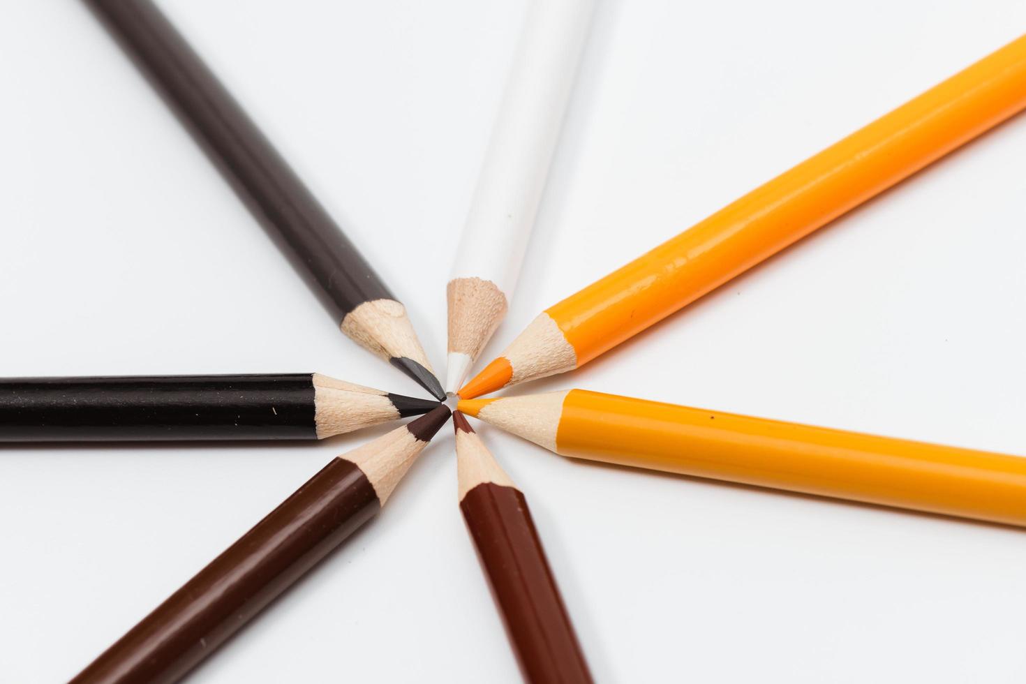 Multi color pencils. the concept of a multinational family and equality in the world. photo