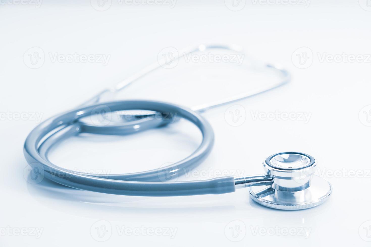 Stethoscope for doctor checkup on table photo