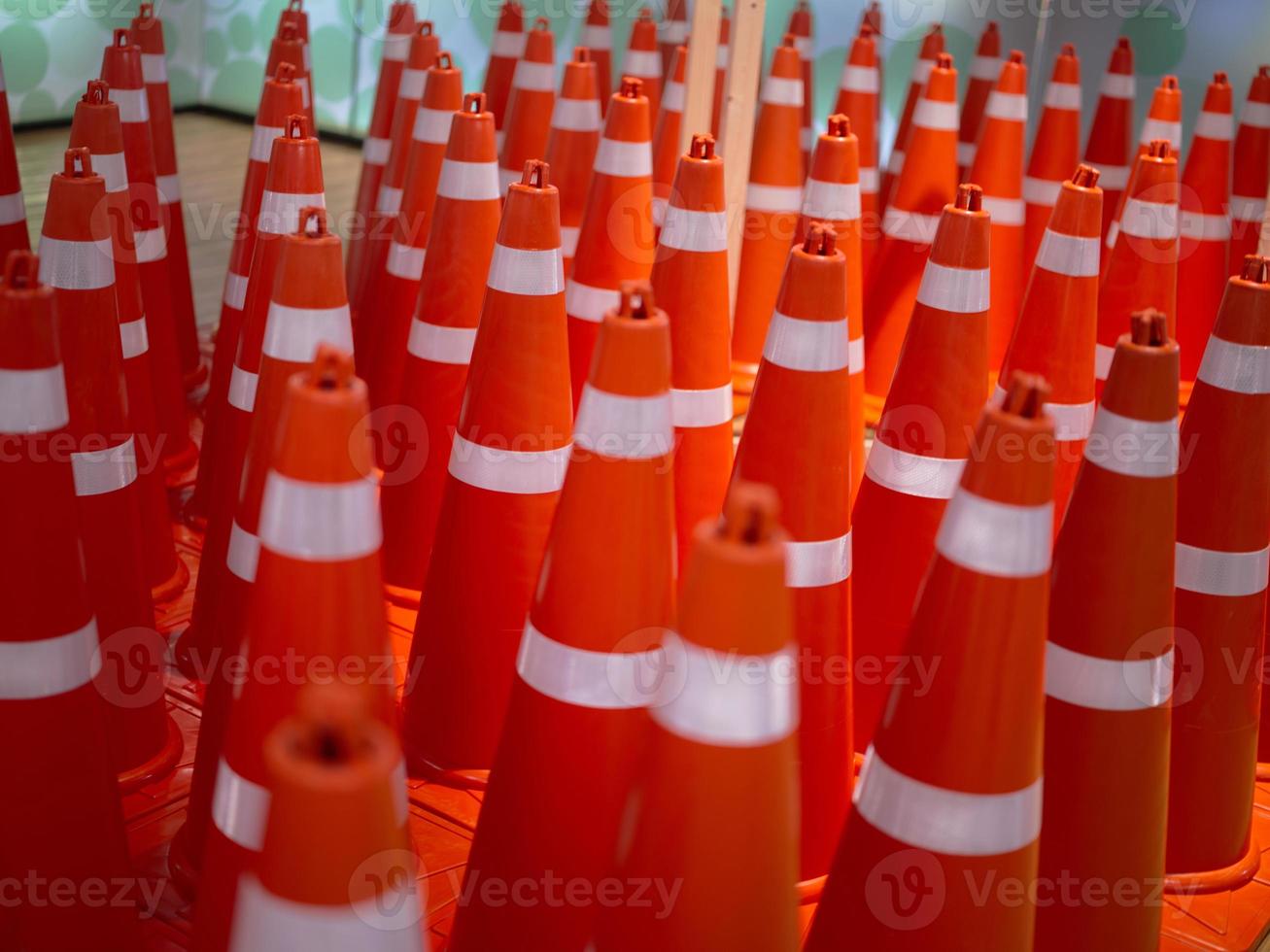 A row of traffic cones background . Concept  traffic photo