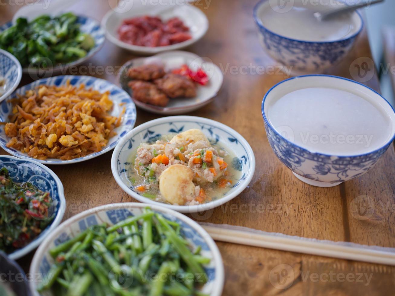 Rice gruel and side dish . Concept breakfast THAI STYLE photo