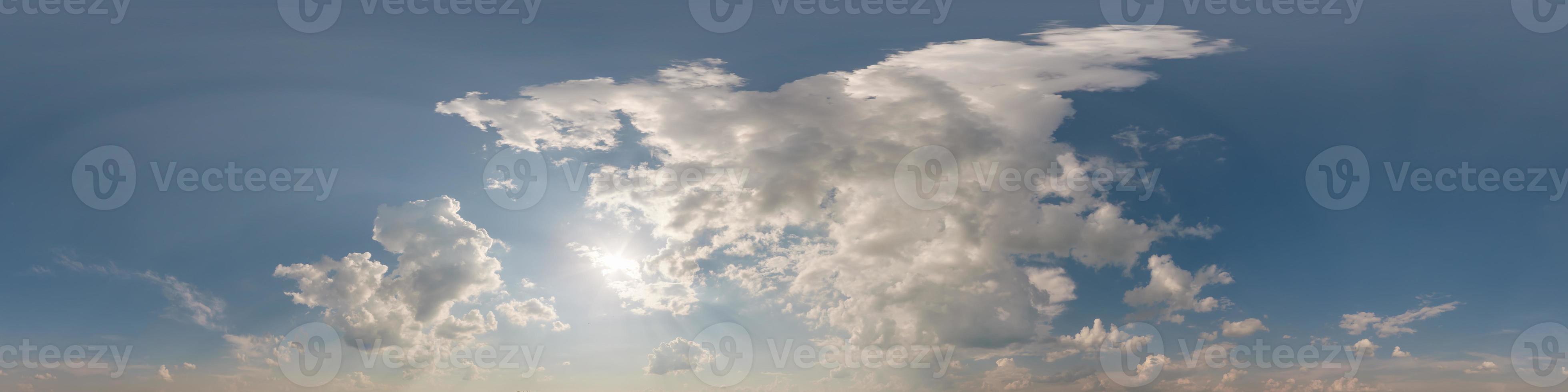 blue sky with beautiful clouds as seamless hdri 360 panorama view with zenith for use in 3d graphics or game development as sky dome or edit drone shot photo
