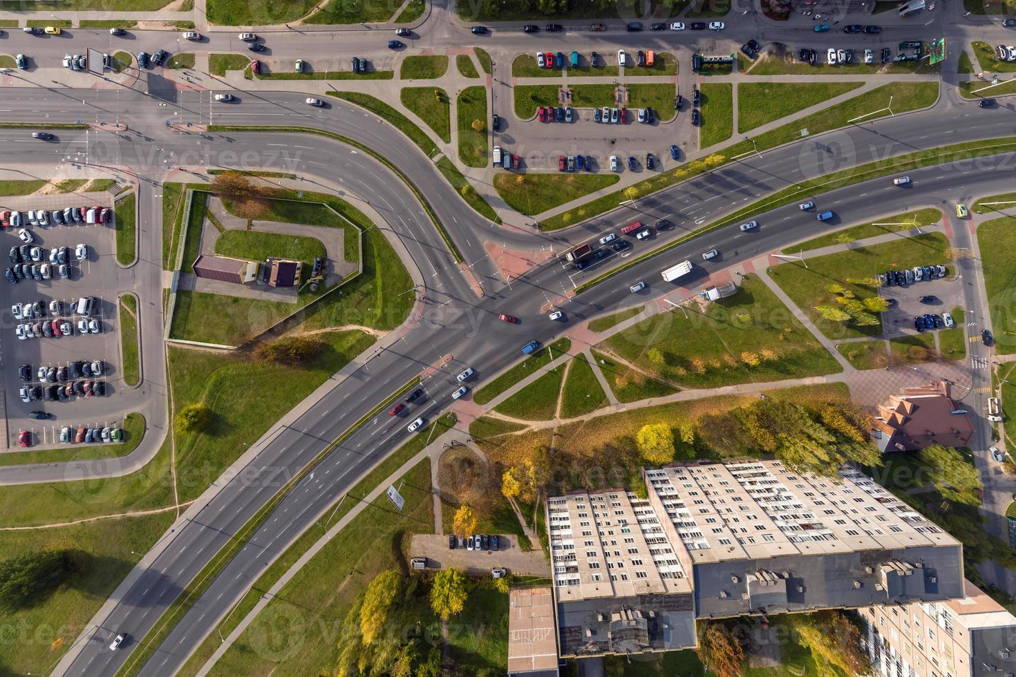 aerial view of road interchange or highway intersection. Junction network of transportation taken by drone. photo