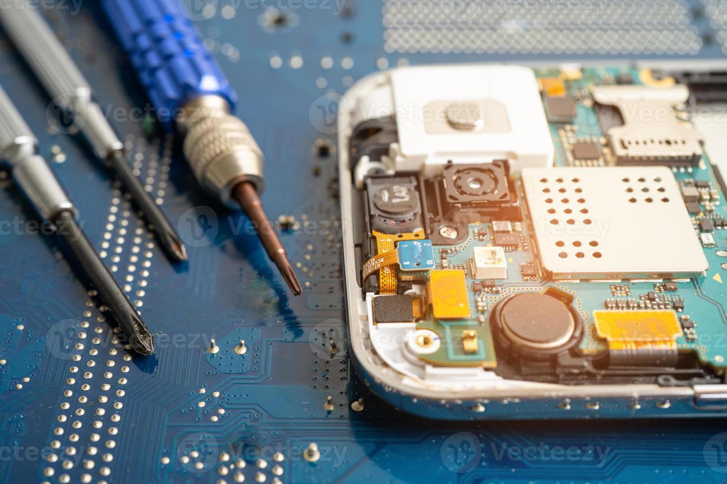 Repairing and upgrade mobile phone, electronic, computer hardware and technology concept. photo