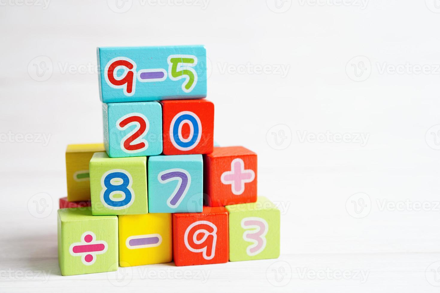 Number wood block cubes for learning Mathematic, education math concept. photo